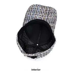Detail view of the internal lining and stitching of the tweed baseball cap