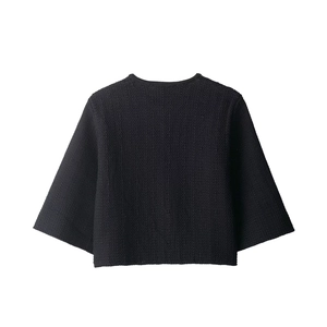 Women's chic black knitted jacket with round neck and half sleeves back view profile