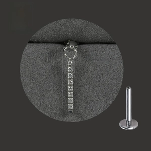 Macro view of G23 solid titanium labret stud with 16.7mm long zircon chain pendant