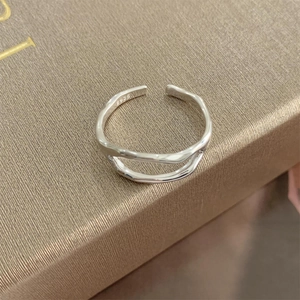 Detailed shot of S925 sterling silver irregular open ring with s925 authenticity hallmark