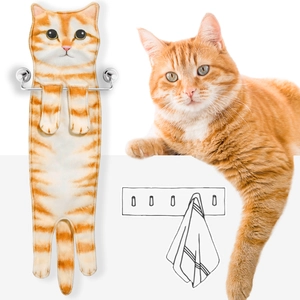 Detail of hanging cat-shaped towel in orange stripes with cute realistic microfiber texture