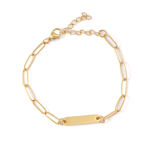 Detailed view of golden stainless steel paperclip chain bracelet with engravable blank bar