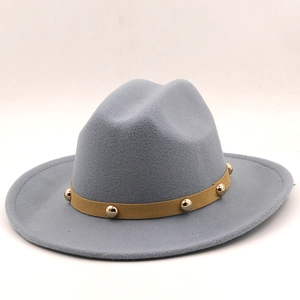 Detail of light gray felt fedora hat featuring a camel leather strap with silver metal beads