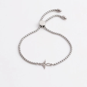 Polished silver stainless steel adjustable bracelet with a bird shaped pendant charm