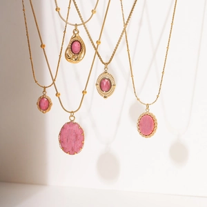 Five 18K gold-plated titanium steel necklaces with pink gemstone pendants and various chains