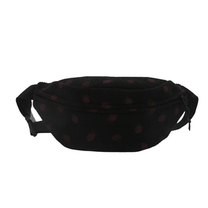 Minimalist black strawberry waist bag with corduroy texture and adjustable strap