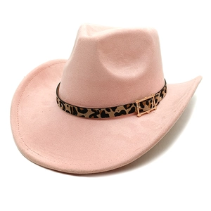 Detail of pink faux suede cowboy hat featuring a leopard print band and gold buckle
