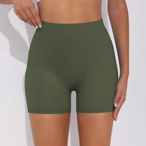 Detail of high-waist seamless olive green yoga shorts showing breathable ribbed fabric texture
