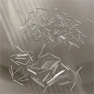 Macro shot of 0.5x4mm and 0.5x7mm silver reflective metal strips for nail art decoration