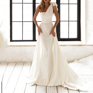 Elegant white sequin mermaid dress with a single shoulder bow and long satin side train