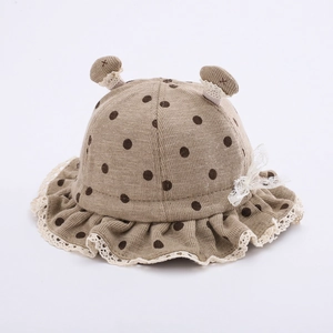 Cute brown polka dot baby sun hat with lace bow and 3D ears on a white background