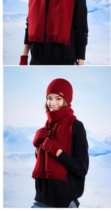 Detail of red winter knit set featuring fringe scarf and soft textured warm gloves