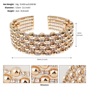Detailed view of gold multi-layer cuff bracelet with rhinestones and metal beads