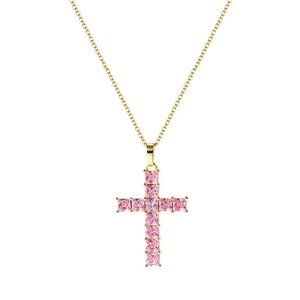 Detail of gold-plated cross pendant featuring square pink cubic zirconia pavé stones