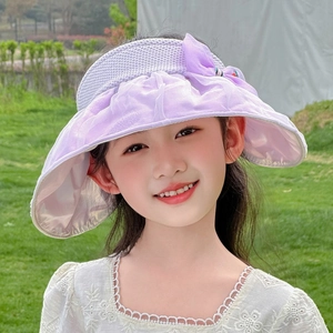 Purple girls sun hat with large wavy brim and bow detail for outdoor summer protection