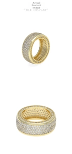 Macro detail of gold plated iced out ring with cubic zirconia micro-pave and hollow inner