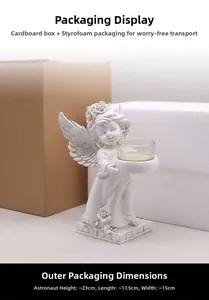 White resin angel candlestick with floral base relief in secure shipping packaging
