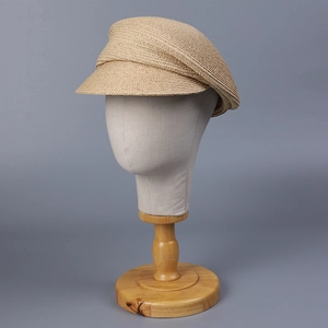 Premium raffia grass newsboy cap in beige with spiral weave and decorative side pleat