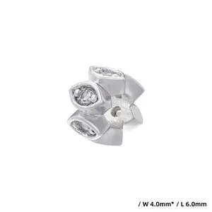Macro shot of a 4.0mm x 6.0mm silver plated jewelry charm with marquise cubic zirconia
