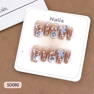 Brown gradient press-on nails with 3D white roses, pearls and butterfly nail art