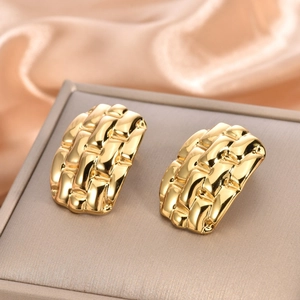 Minimalist 18K gold plated stainless steel drop earrings with woven texture on silk
