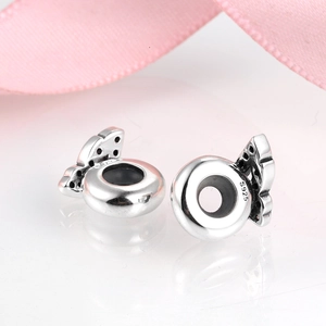 925 sterling silver butterfly wings spacer beads for DIY jewelry on white surface