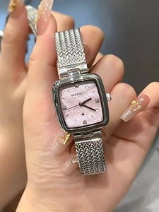 Detailed close-up of a ladies' square quartz watch with pink mother of pearl dial