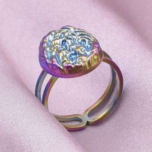 Macro shot of 304 stainless steel adjustable ring with colorful lava texture and dual-row band
