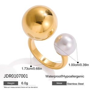 Detail of 18K gold stainless steel open ring showing pearl ball and size measurements