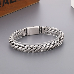 Detailed view of vintage silver stainless steel biker chain bracelet with rectangle clasp