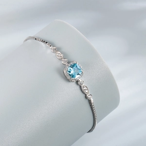 S925 Sterling Silver Ocean Star Bracelet with blue topaz and cubic zirconia on display