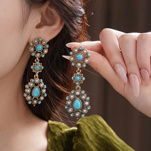 Vintage bohemian gold drop earrings with turquoise stones and pearl accents for women