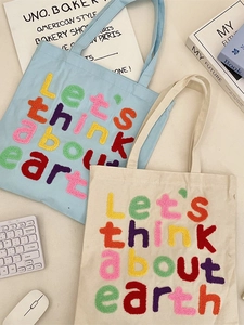 Canvas tote bags with colorful chenille letter embroidery and large capacity for daily use