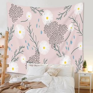 Detail of pink bohemian tapestry with daisy patterns and soft polyester texture