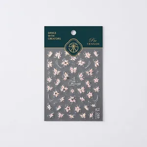 3D butterfly and floral nail art stickers with pink pearlescent finish and gold accents
