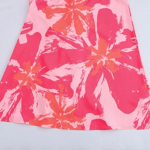 Summer pink one-shoulder dress with vibrant red and orange floral chiffon patterns