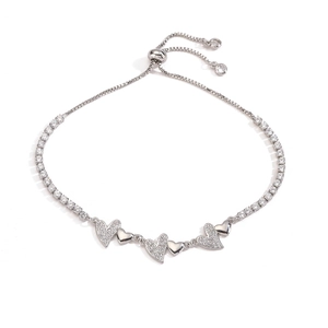 Detail of adjustable silver heart bracelet with cubic zirconia and bolo slider clasp