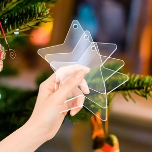 Close-up of clear acrylic star ornament for Christmas DIY with a hole for hanging