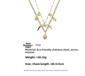 Detail of 18k gold plated double-layer necklace showing dimensions and multiple charms