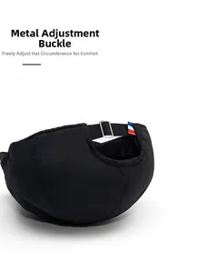 Close-up of black summer cap back with adjustable metal buckle and tricolor flag tag