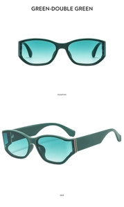 Detail view of dark green sunglasses with gradient lenses and side metal accents
