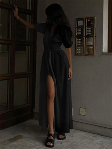 Women's black V-neck puff sleeve maxi dress with button-down front and side slit