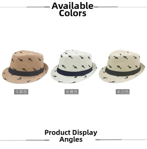 Detailed view of woven straw fedora hats with shark patterns in khaki and beige tones