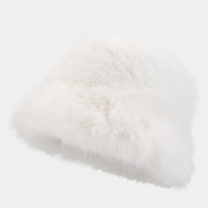 Close-up of white fluffy faux fox fur bucket hat showing soft plush texture and thick brim