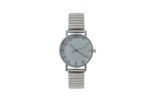 Detailed close-up of fashion quartz watch with stretch band and faceted crystal glass lens