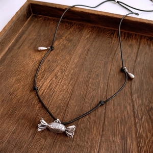 French vintage adjustable leather pearl necklace with candy-shaped engraved pendant