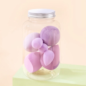 Barattolo di spugne per trucco viola e rosa chiaro in forme a goccia e a zucca