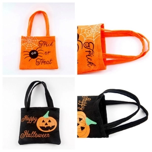 Detail of Halloween non-woven treat bags with pumpkin and spider web silk printing
