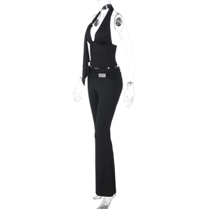 Detail view of black halter backless top and high-waist flared pants set for women