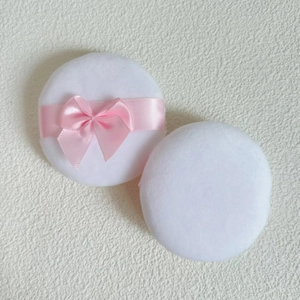 Soft white crystal velvet powder puffs with pink bow tie for makeup setting